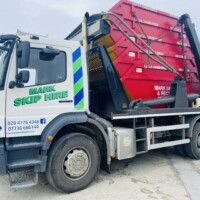 Lorry loaded with skips